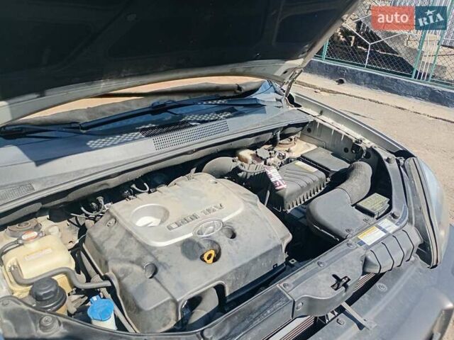 Сірий Хендай Туксон, об'ємом двигуна 1.99 л та пробігом 252 тис. км за 7000 $, фото 18 на Automoto.ua