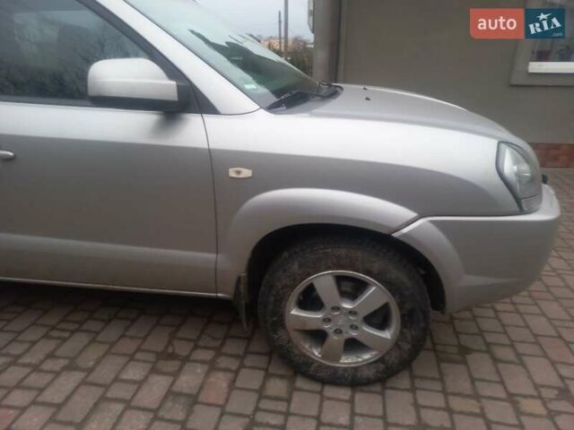 Серый Хендай Туксон, объемом двигателя 2 л и пробегом 226 тыс. км за 6200 $, фото 7 на Automoto.ua