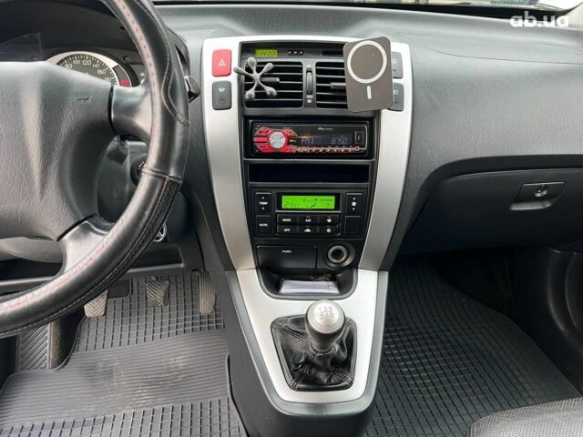 Сірий Хендай Туксон, об'ємом двигуна 2 л та пробігом 263 тис. км за 7440 $, фото 24 на Automoto.ua