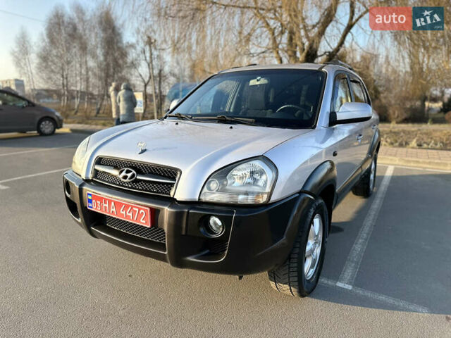 Серый Хендай Туксон, объемом двигателя 1.98 л и пробегом 223 тыс. км за 6750 $, фото 9 на Automoto.ua