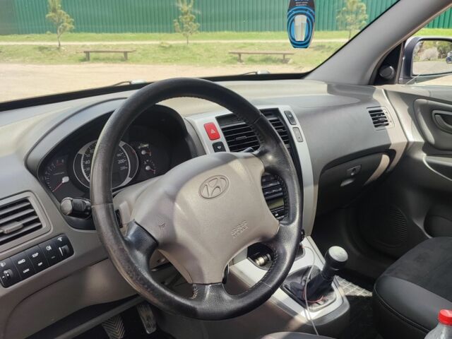 Сірий Хендай Туксон, об'ємом двигуна 2 л та пробігом 248 тис. км за 7199 $, фото 6 на Automoto.ua