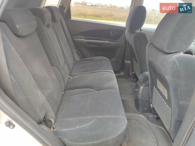 Серый Хендай Туксон, объемом двигателя 1.99 л и пробегом 210 тыс. км за 7900 $, фото 17 на Automoto.ua