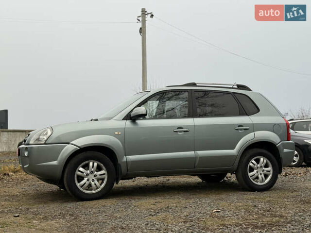 Серый Хендай Туксон, объемом двигателя 2 л и пробегом 231 тыс. км за 6999 $, фото 8 на Automoto.ua