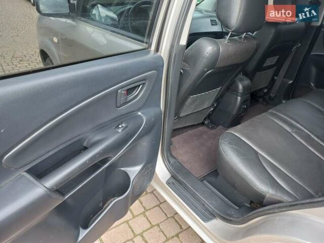 Сірий Хендай Туксон, об'ємом двигуна 2 л та пробігом 224 тис. км за 6400 $, фото 12 на Automoto.ua