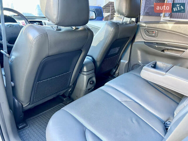 Сірий Хендай Туксон, об'ємом двигуна 2 л та пробігом 215 тис. км за 7350 $, фото 39 на Automoto.ua