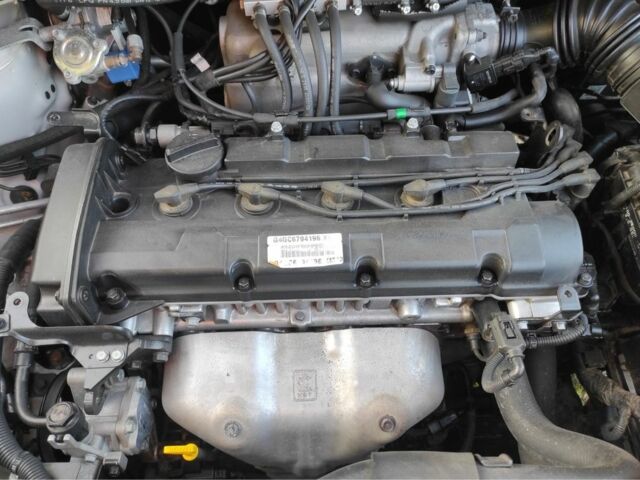 Сірий Хендай Туксон, об'ємом двигуна 2 л та пробігом 159 тис. км за 6700 $, фото 5 на Automoto.ua