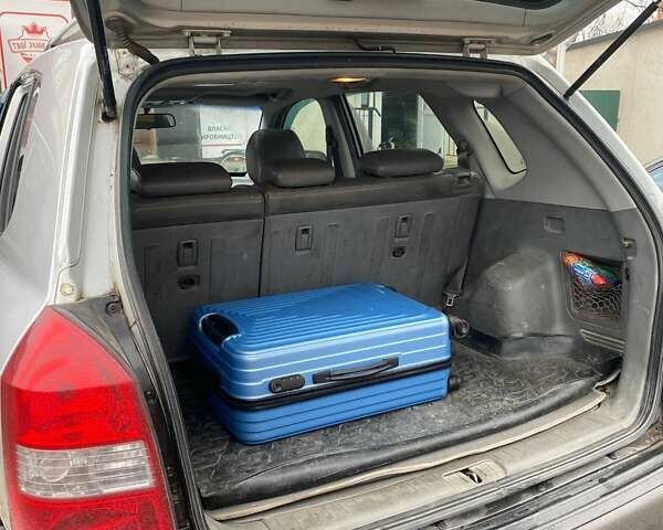 Серый Хендай Туксон, объемом двигателя 1.98 л и пробегом 252 тыс. км за 6199 $, фото 7 на Automoto.ua