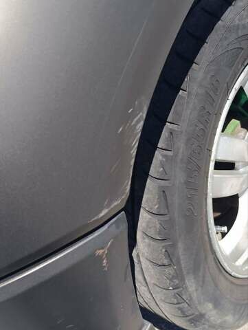 Серый Хендай Туксон, объемом двигателя 2 л и пробегом 258 тыс. км за 7500 $, фото 9 на Automoto.ua