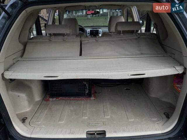 Сірий Хендай Туксон, об'ємом двигуна 2 л та пробігом 304 тис. км за 7500 $, фото 7 на Automoto.ua