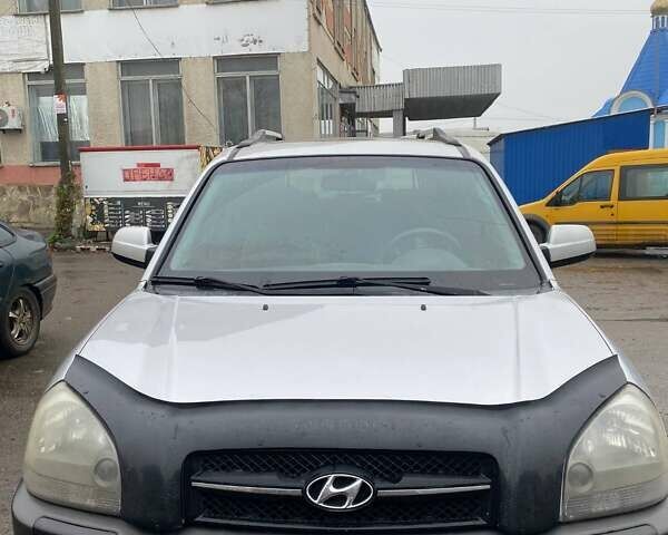 Серый Хендай Туксон, объемом двигателя 1.98 л и пробегом 252 тыс. км за 6199 $, фото 8 на Automoto.ua