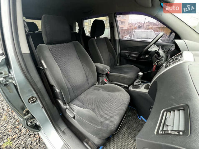 Серый Хендай Туксон, объемом двигателя 1.98 л и пробегом 253 тыс. км за 7650 $, фото 17 на Automoto.ua