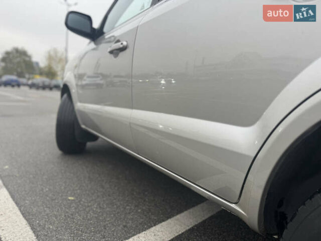 Серый Хендай Туксон, объемом двигателя 1.98 л и пробегом 175 тыс. км за 7800 $, фото 9 на Automoto.ua