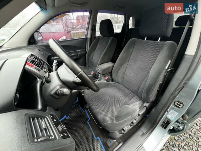 Серый Хендай Туксон, объемом двигателя 1.98 л и пробегом 253 тыс. км за 7650 $, фото 14 на Automoto.ua