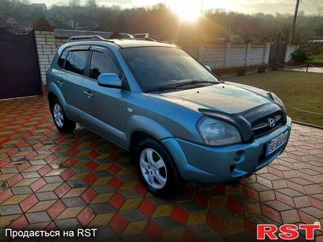 Серый Хендай Туксон, объемом двигателя 2 л и пробегом 175 тыс. км за 6250 $, фото 2 на Automoto.ua