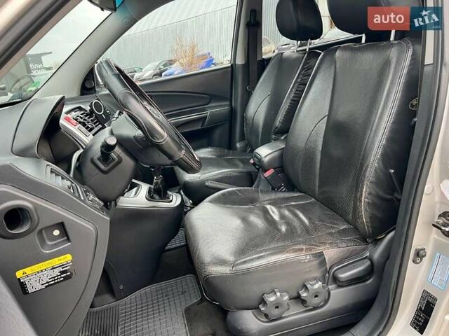 Серый Хендай Туксон, объемом двигателя 2 л и пробегом 263 тыс. км за 7440 $, фото 17 на Automoto.ua