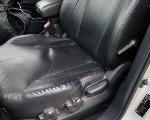 Серый Хендай Туксон, объемом двигателя 1.98 л и пробегом 278 тыс. км за 5300 $, фото 26 на Automoto.ua