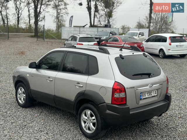 Серый Хендай Туксон, объемом двигателя 1.98 л и пробегом 241 тыс. км за 7000 $, фото 25 на Automoto.ua