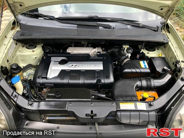 Сірий Хендай Туксон, об'ємом двигуна 2 л та пробігом 252 тис. км за 8300 $, фото 6 на Automoto.ua