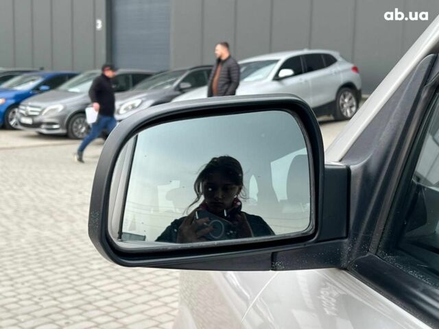 Сірий Хендай Туксон, об'ємом двигуна 2 л та пробігом 263 тис. км за 7440 $, фото 13 на Automoto.ua