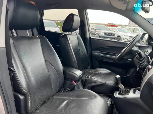 Сірий Хендай Туксон, об'ємом двигуна 2 л та пробігом 263 тис. км за 7440 $, фото 35 на Automoto.ua