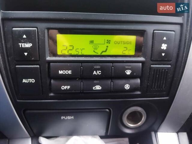 Серый Хендай Туксон, объемом двигателя 1.98 л и пробегом 278 тыс. км за 5300 $, фото 31 на Automoto.ua