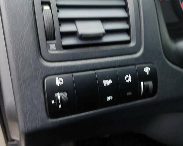 Серый Хендай Туксон, объемом двигателя 1.98 л и пробегом 278 тыс. км за 5300 $, фото 28 на Automoto.ua