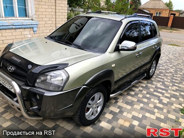 Сірий Хендай Туксон, об'ємом двигуна 2 л та пробігом 252 тис. км за 8300 $, фото 7 на Automoto.ua