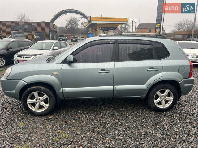 Серый Хендай Туксон, объемом двигателя 1.98 л и пробегом 253 тыс. км за 7650 $, фото 6 на Automoto.ua