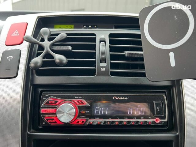 Сірий Хендай Туксон, об'ємом двигуна 2 л та пробігом 263 тис. км за 7440 $, фото 25 на Automoto.ua