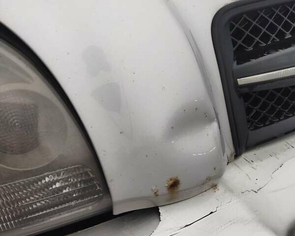 Серый Хендай Туксон, объемом двигателя 1.98 л и пробегом 278 тыс. км за 5300 $, фото 23 на Automoto.ua