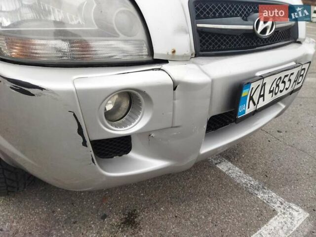 Серый Хендай Туксон, объемом двигателя 1.98 л и пробегом 278 тыс. км за 5300 $, фото 15 на Automoto.ua