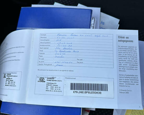 Серый Хендай Туксон, объемом двигателя 1.98 л и пробегом 223 тыс. км за 6750 $, фото 43 на Automoto.ua