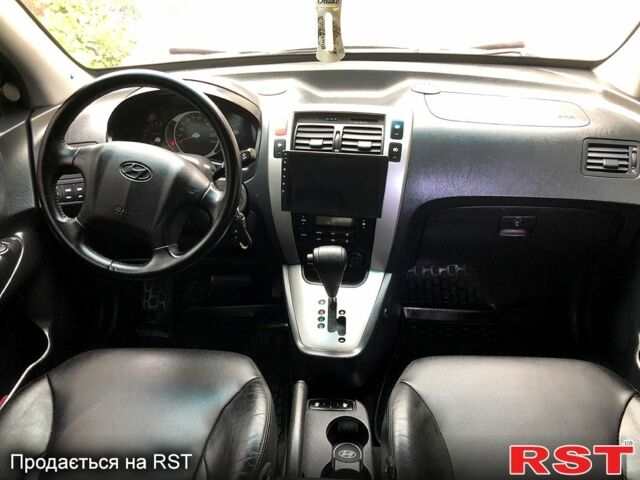 Сірий Хендай Туксон, об'ємом двигуна 2 л та пробігом 252 тис. км за 8300 $, фото 4 на Automoto.ua