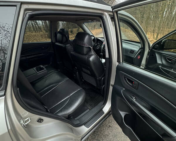 Серый Хендай Туксон, объемом двигателя 1.98 л и пробегом 269 тыс. км за 7100 $, фото 23 на Automoto.ua