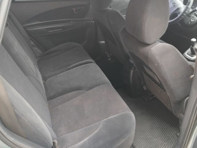 Серый Хендай Туксон, объемом двигателя 2 л и пробегом 2 тыс. км за 6800 $, фото 9 на Automoto.ua