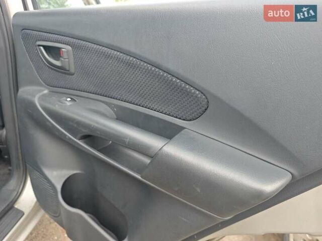 Серый Хендай Туксон, объемом двигателя 1.98 л и пробегом 173 тыс. км за 7450 $, фото 11 на Automoto.ua