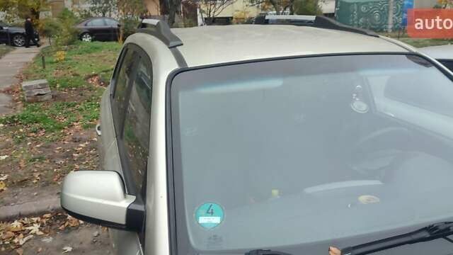 Серый Хендай Туксон, объемом двигателя 1.98 л и пробегом 169 тыс. км за 7500 $, фото 1 на Automoto.ua