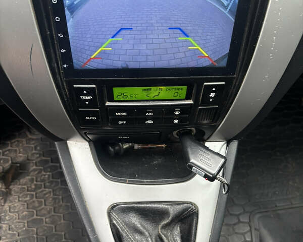 Сірий Хендай Туксон, об'ємом двигуна 2 л та пробігом 255 тис. км за 7600 $, фото 25 на Automoto.ua