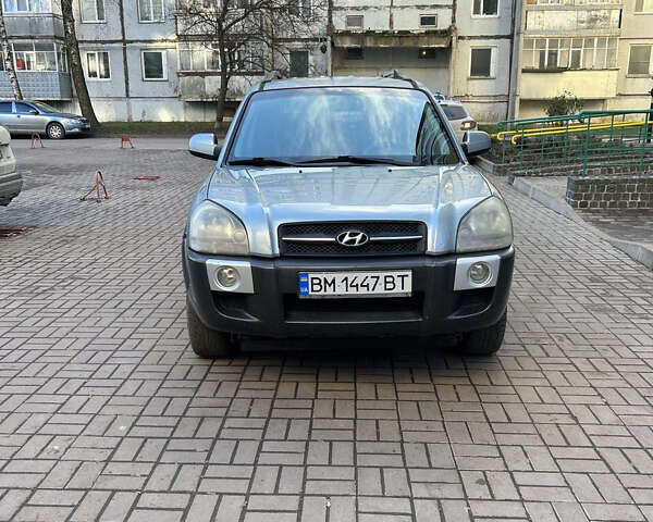 Серый Хендай Туксон, объемом двигателя 1.98 л и пробегом 269 тыс. км за 7500 $, фото 12 на Automoto.ua