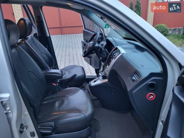 Серый Хендай Туксон, объемом двигателя 2 л и пробегом 240 тыс. км за 8300 $, фото 104 на Automoto.ua