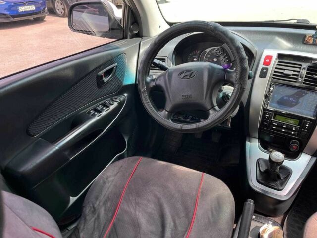 Хендай Туксон 2007 в Львове на Automoto.ua Серый Хендай Туксон, объемом двигателя 2 л и пробегом 255 тыс. км за 6590 $, фото 21 на Automoto.ua