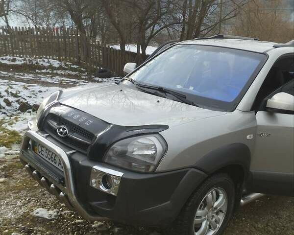 Сірий Хендай Туксон, об'ємом двигуна 1.98 л та пробігом 169 тис. км за 10500 $, фото 7 на Automoto.ua