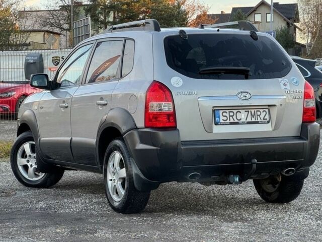 Серый Хендай Туксон, объемом двигателя 2 л и пробегом 262 тыс. км за 3750 $, фото 3 на Automoto.ua