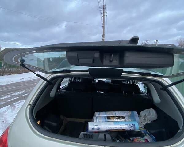 Серый Хендай Туксон, объемом двигателя 2 л и пробегом 213 тыс. км за 7999 $, фото 10 на Automoto.ua