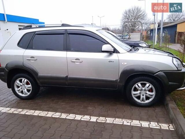Сірий Хендай Туксон, об'ємом двигуна 1.98 л та пробігом 157 тис. км за 7800 $, фото 4 на Automoto.ua