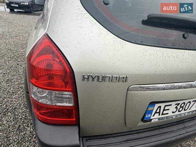 Сірий Хендай Туксон, об'ємом двигуна 1.98 л та пробігом 169 тис. км за 7890 $, фото 16 на Automoto.ua