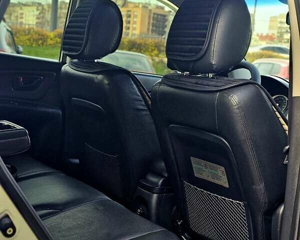 Сірий Хендай Туксон, об'ємом двигуна 2 л та пробігом 198 тис. км за 8250 $, фото 11 на Automoto.ua