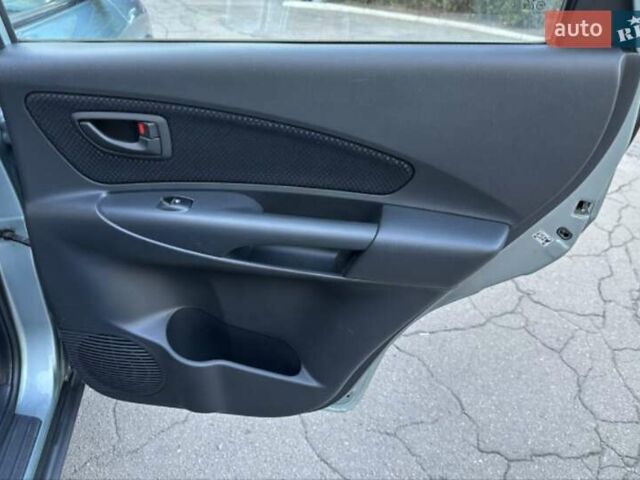 Серый Хендай Туксон, объемом двигателя 2 л и пробегом 110 тыс. км за 10200 $, фото 41 на Automoto.ua