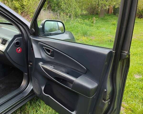 Серый Хендай Туксон, объемом двигателя 1.99 л и пробегом 184 тыс. км за 8300 $, фото 23 на Automoto.ua