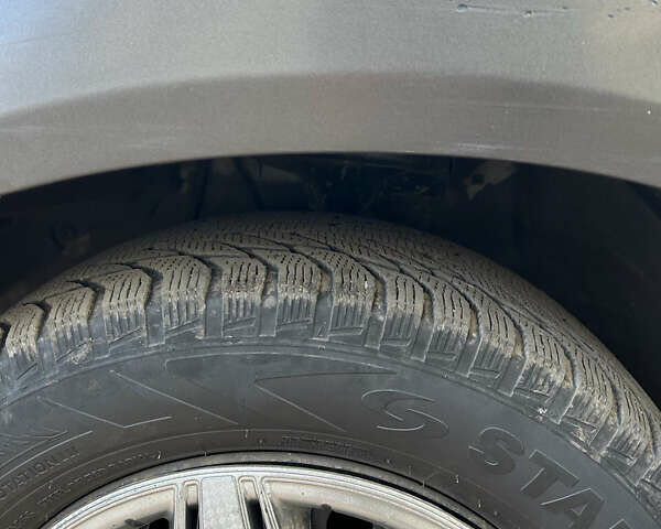 Серый Хендай Туксон, объемом двигателя 1.98 л и пробегом 269 тыс. км за 7500 $, фото 15 на Automoto.ua